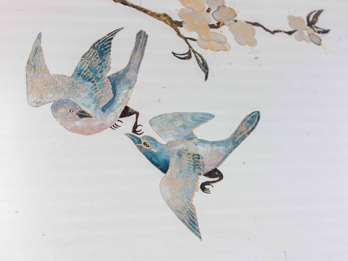 two blue song bird flying gilded glass artwork
