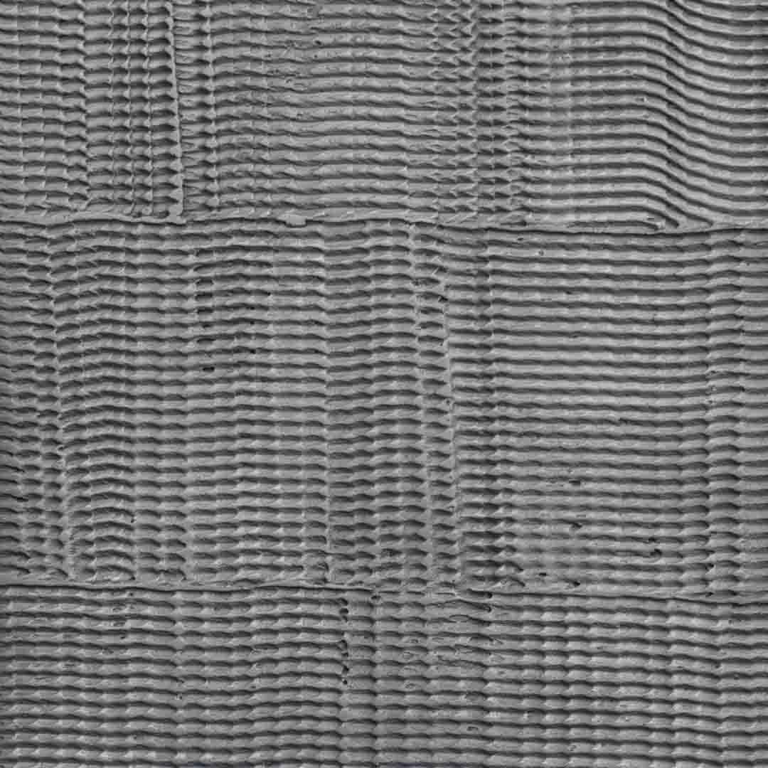 stippled brass bas releif